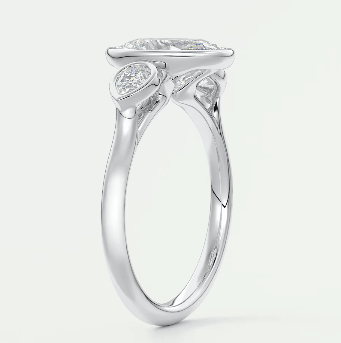 Véda Oval Bezel Three-Stone Engagement Ring – Lab Diamond or Moissanite