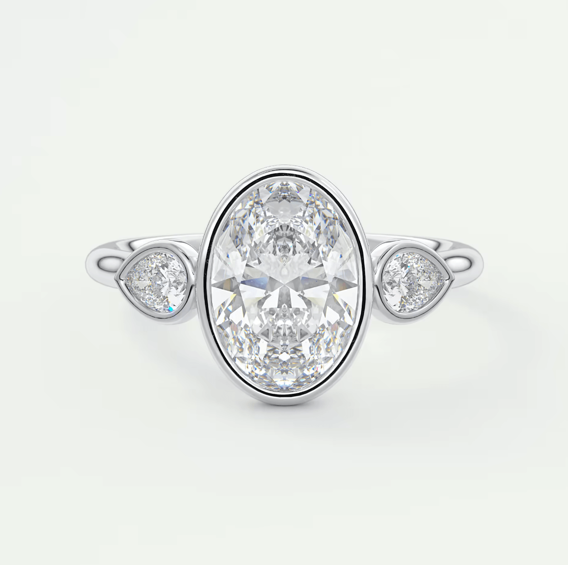 Véda Oval Bezel Three-Stone Engagement Ring – Lab Diamond or Moissanite