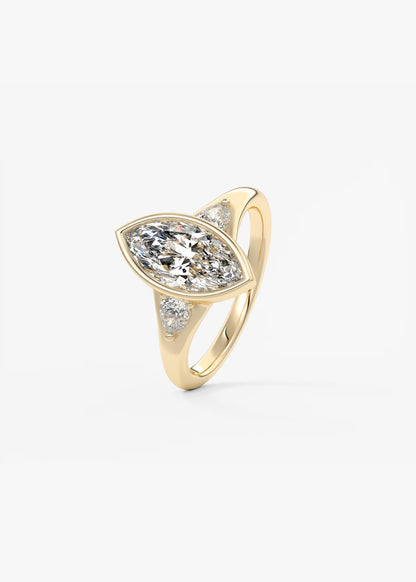Gold ring with a diamond on a white background