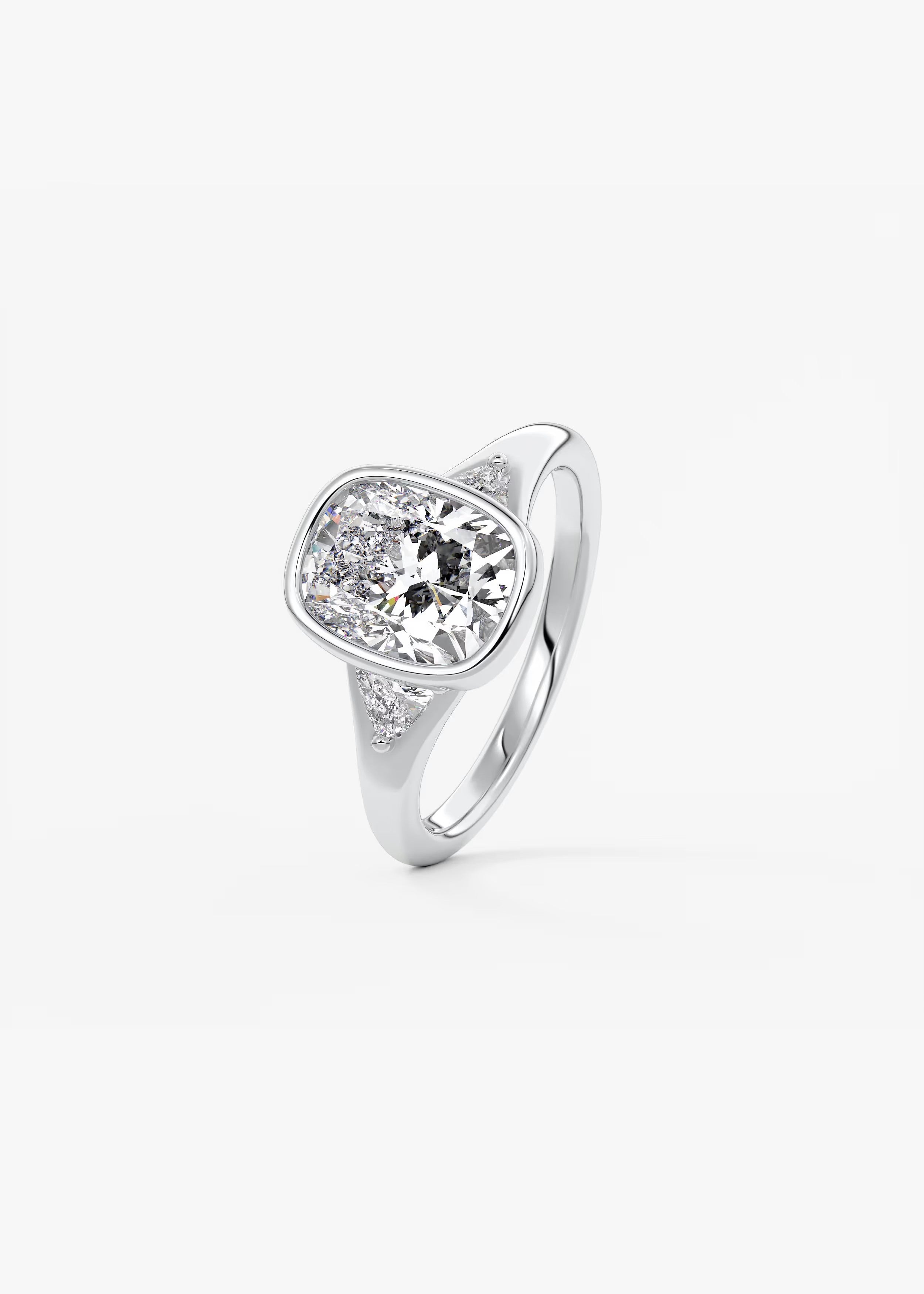 Véda Trilogy – Cushion with Trillion Side Stone Split Shank Engagement Ring