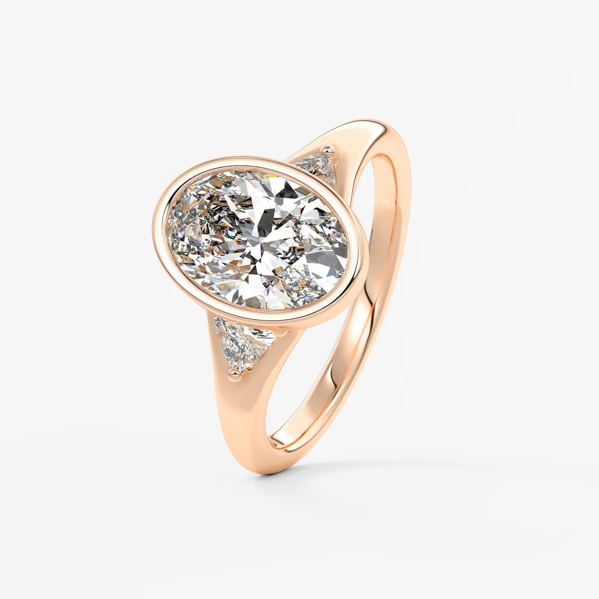 Véda trilogy – oval with trillion side stones