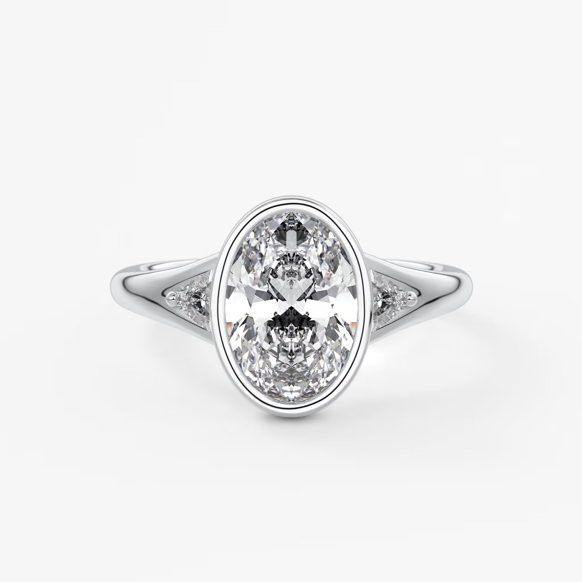 Véda trilogy – oval with trillion side stones