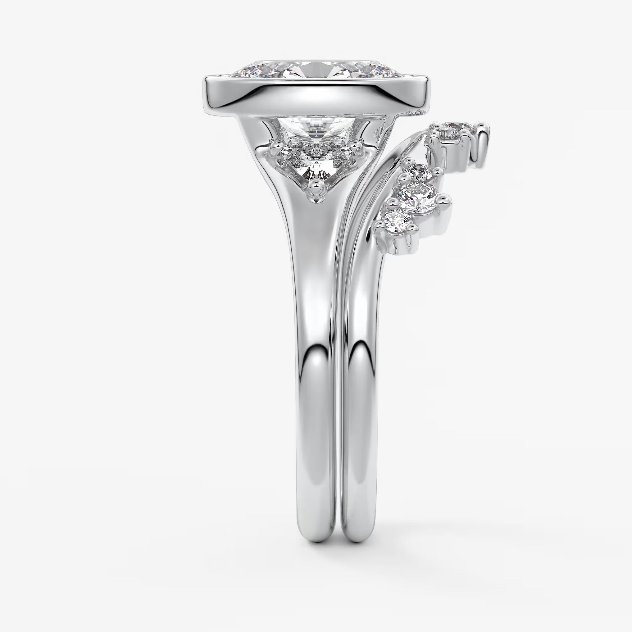 Véda trilogy – oval with trillion side stones