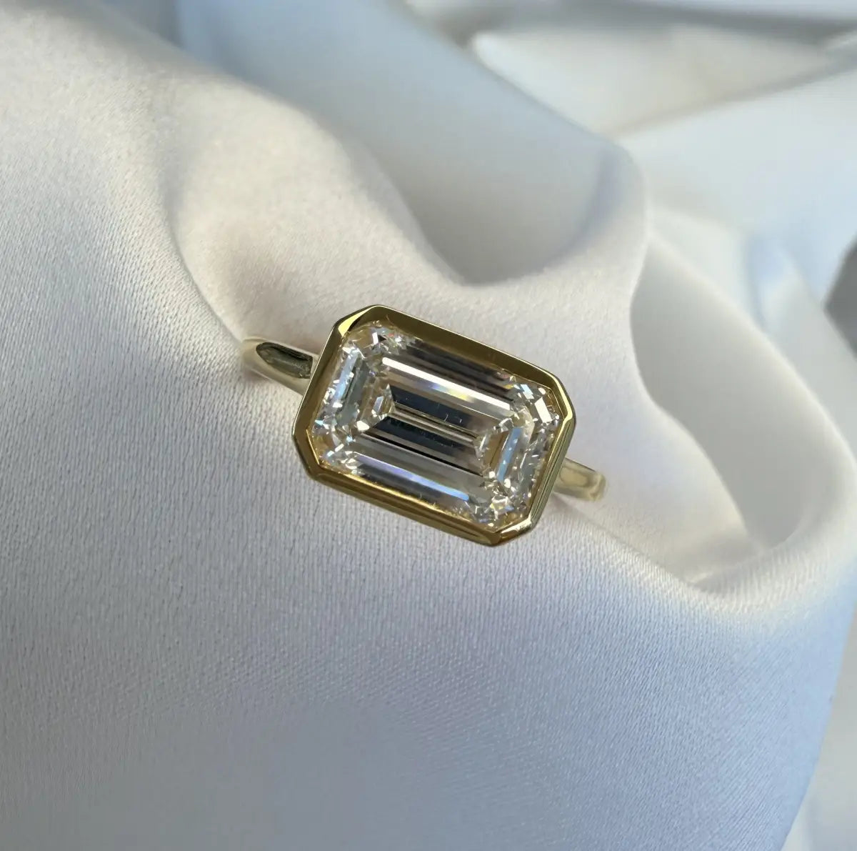 Custom made aeris east-west emerald bezel lab diamond ring 2.08ct d vvs2 | 18k yellow gold