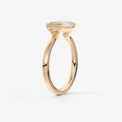 Custom made alosta emerald east-west half bezel engagement ring | lab diamond or moissanite