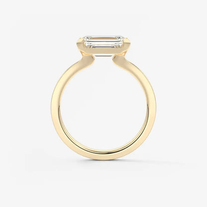 Custom made alosta emerald east-west half bezel engagement ring | lab diamond or moissanite