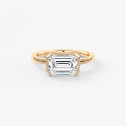 Custom made alosta emerald east-west half bezel engagement ring | lab diamond or moissanite