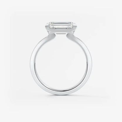 Custom made alosta emerald east-west half bezel engagement ring | lab diamond or moissanite