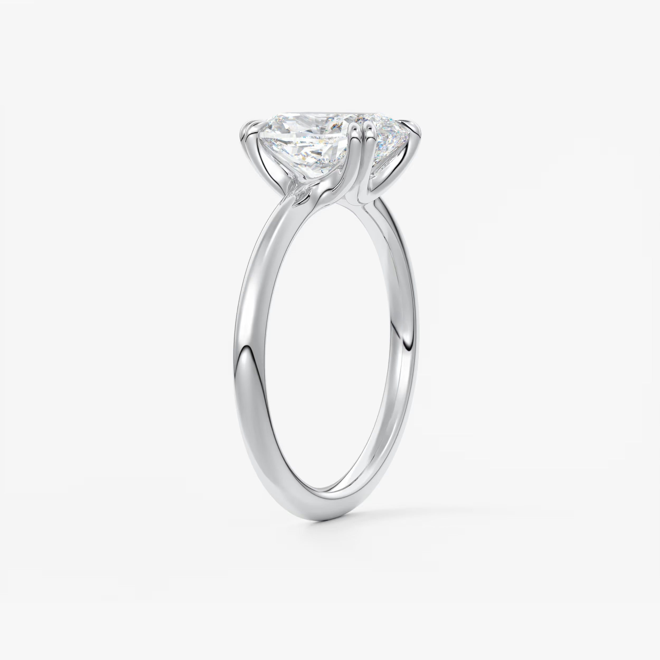 Custom made aura glide elongated cushion solitaire ring – lab diamond or moissanite