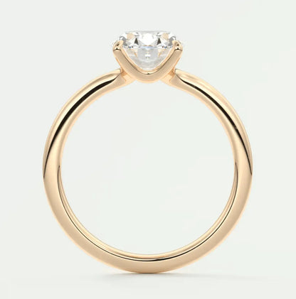 18k gold solitaire diamond engagement ring with a princess cut stone.