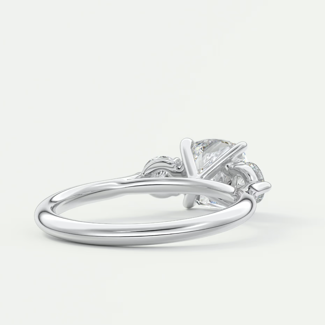 Custom made aveline cushion cathedral three-stone engagement ring | diamond lab