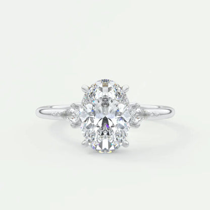 Custom made elysian oval three-stone engagement ring with kite side stones | diamond lab