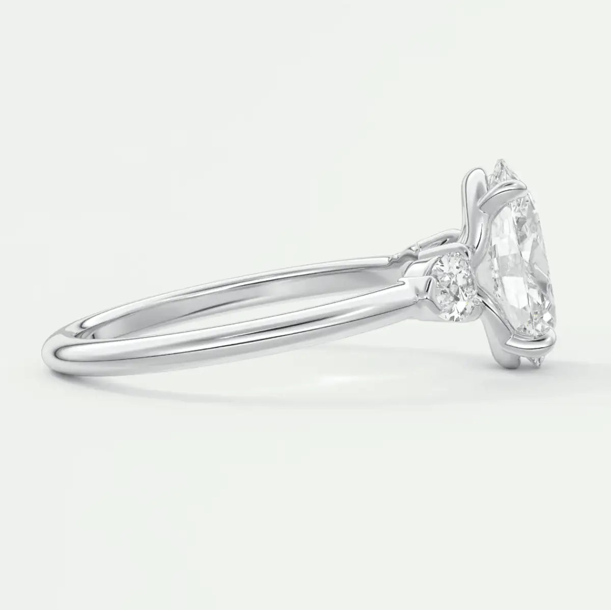 18k white gold engagement ring with a marquise-cut diamond.