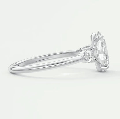 18k white gold engagement ring with a marquise-cut diamond.