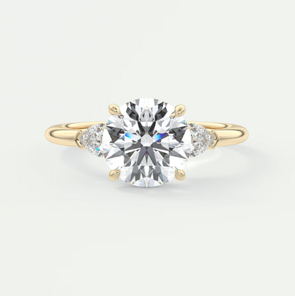 Custom made elysian round three-stone engagement ring with pear side stones | diamond lab