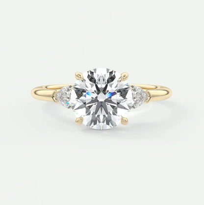 Custom made elysian round three-stone engagement ring with pear side stones | diamond lab