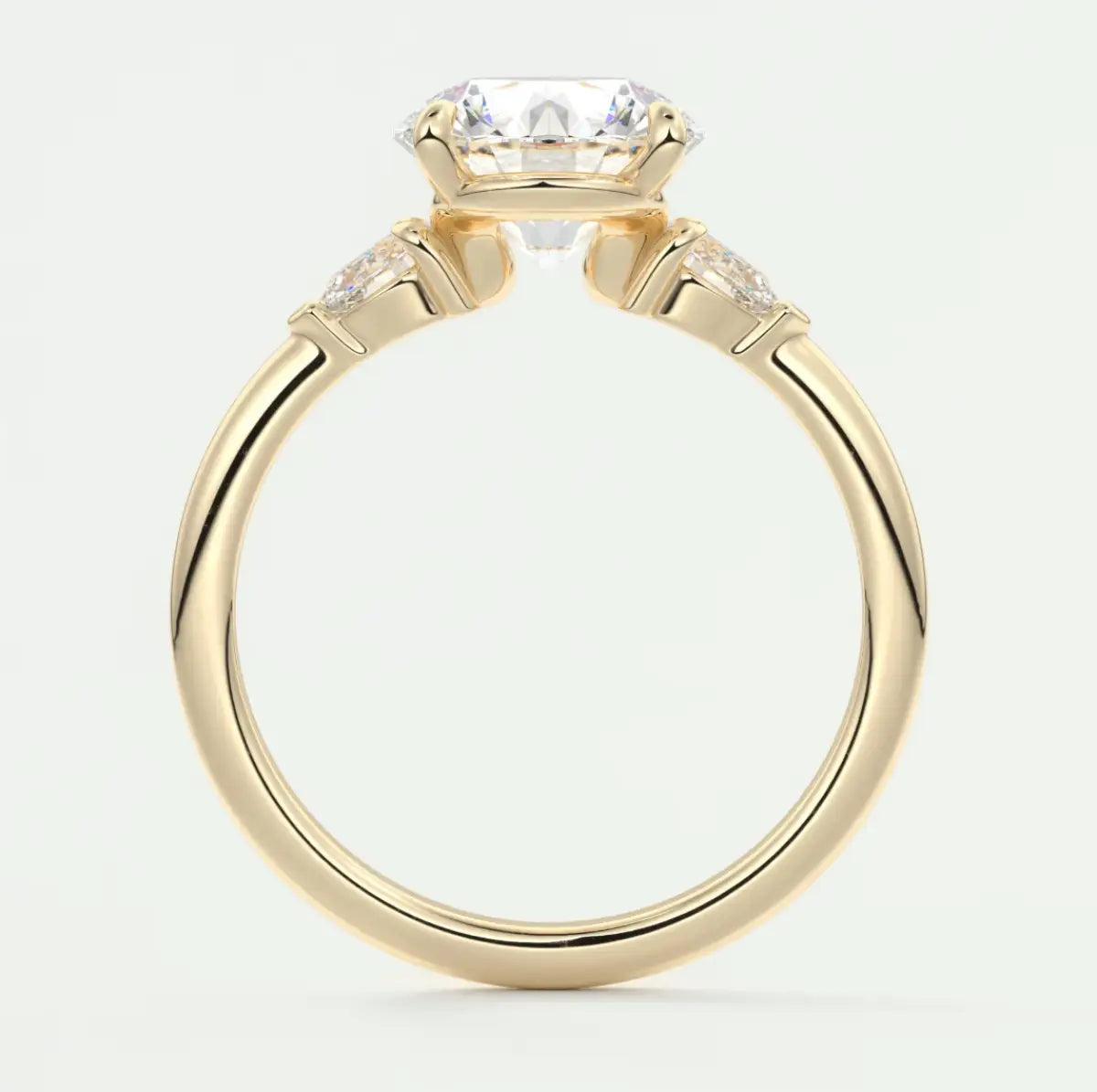 Custom made elysian round three-stone engagement ring with pear side stones | diamond lab