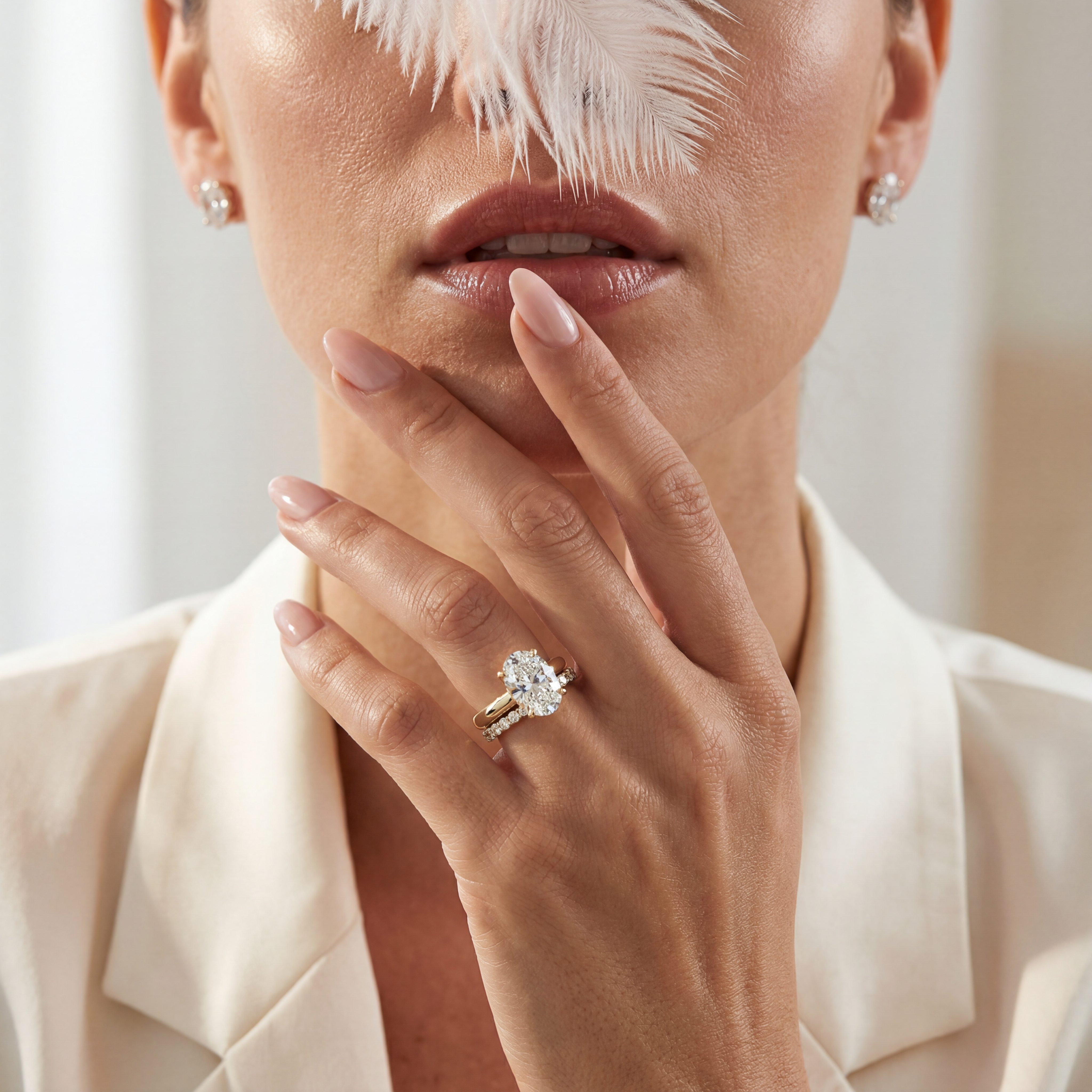 Close-up of a woman wearing a diamond ring with a blurred background