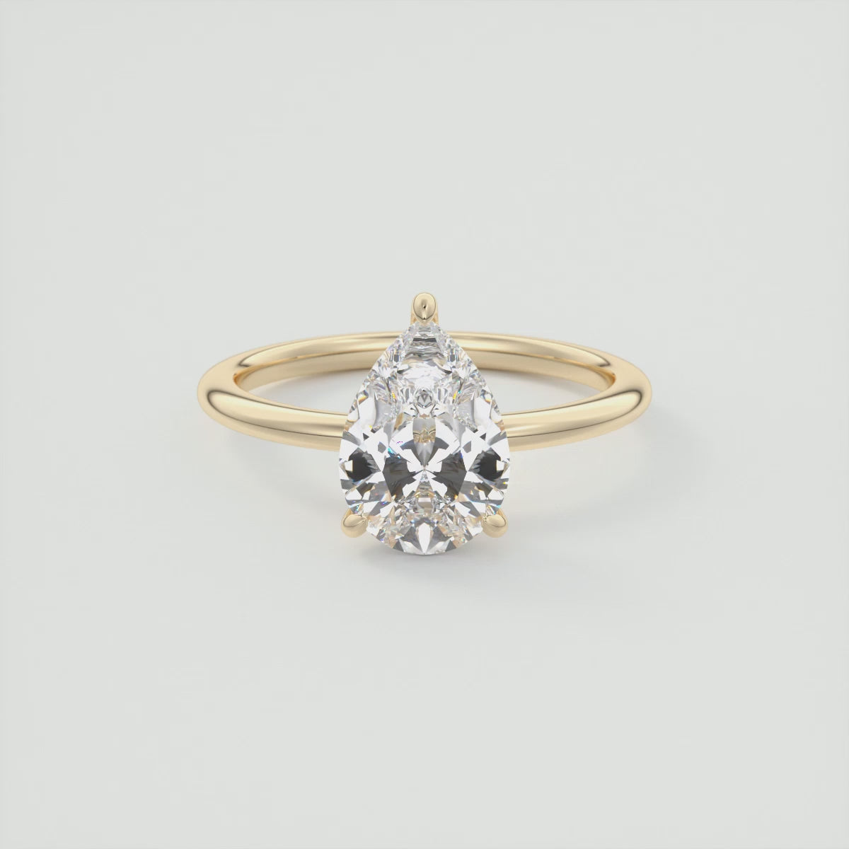 Load video: Celestia Pear Hidden Halo Ring – Lab Diamond or Moissanite