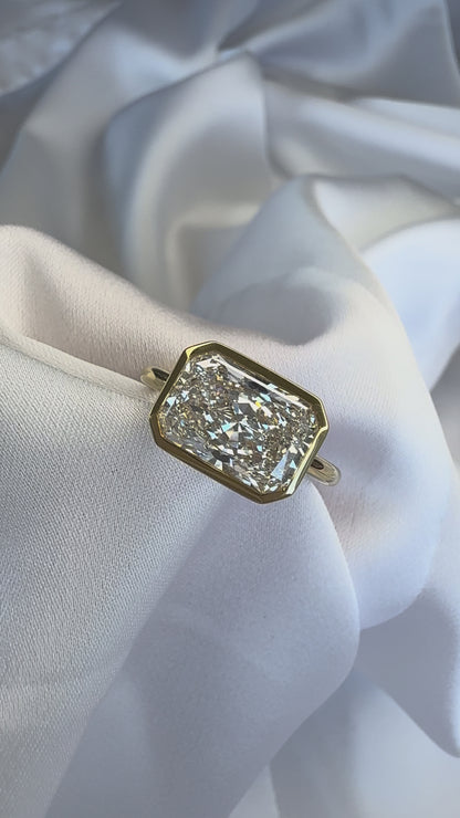 Veda East-West Radiant Bezel Lab Diamond Engagement Ring – 3.08ct D VVS2 | 18K Yellow Gold 1.8mm Band