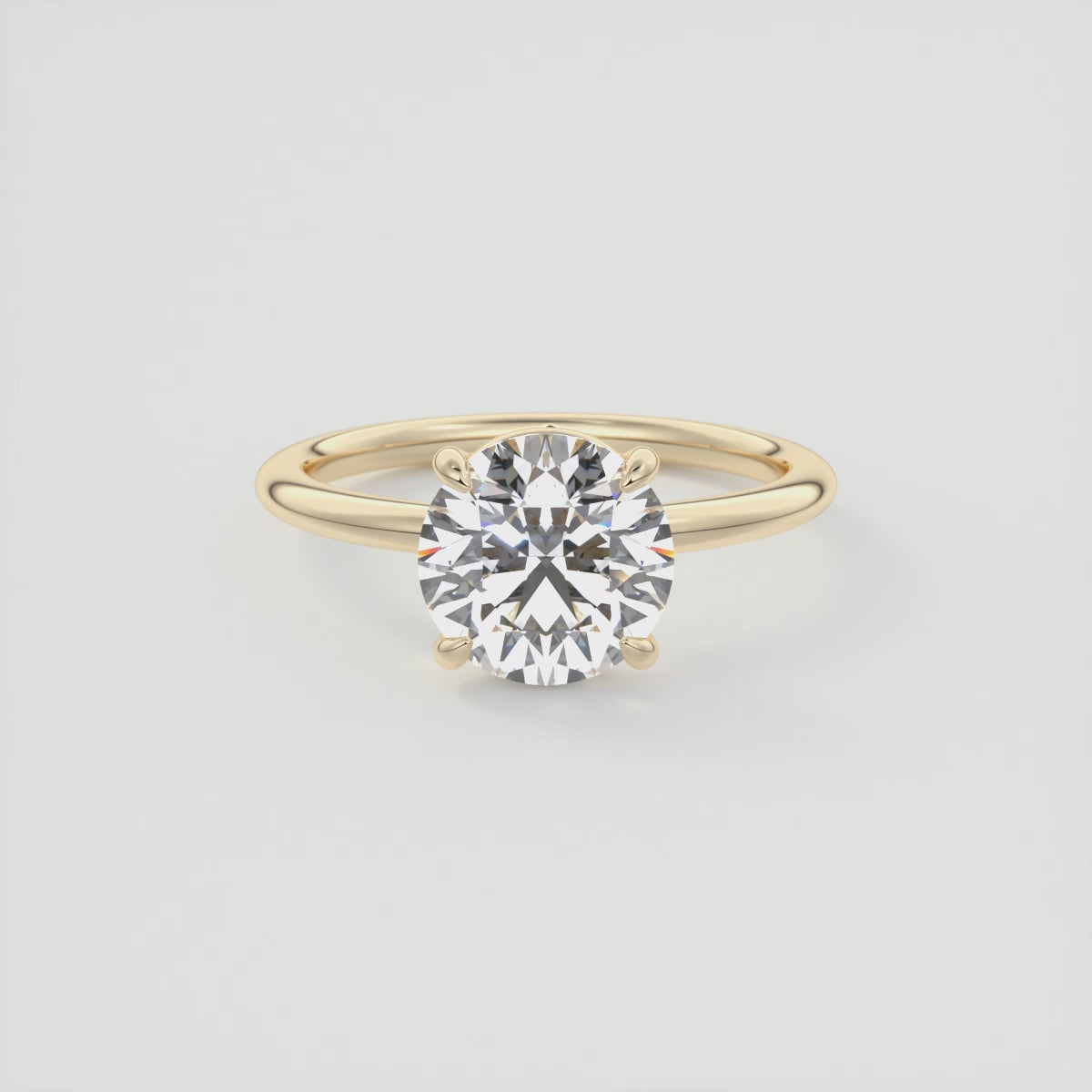 Load video: Elysian Round Solitaire Ring – Timeless Elegance with Lab Diamond or Moissanite