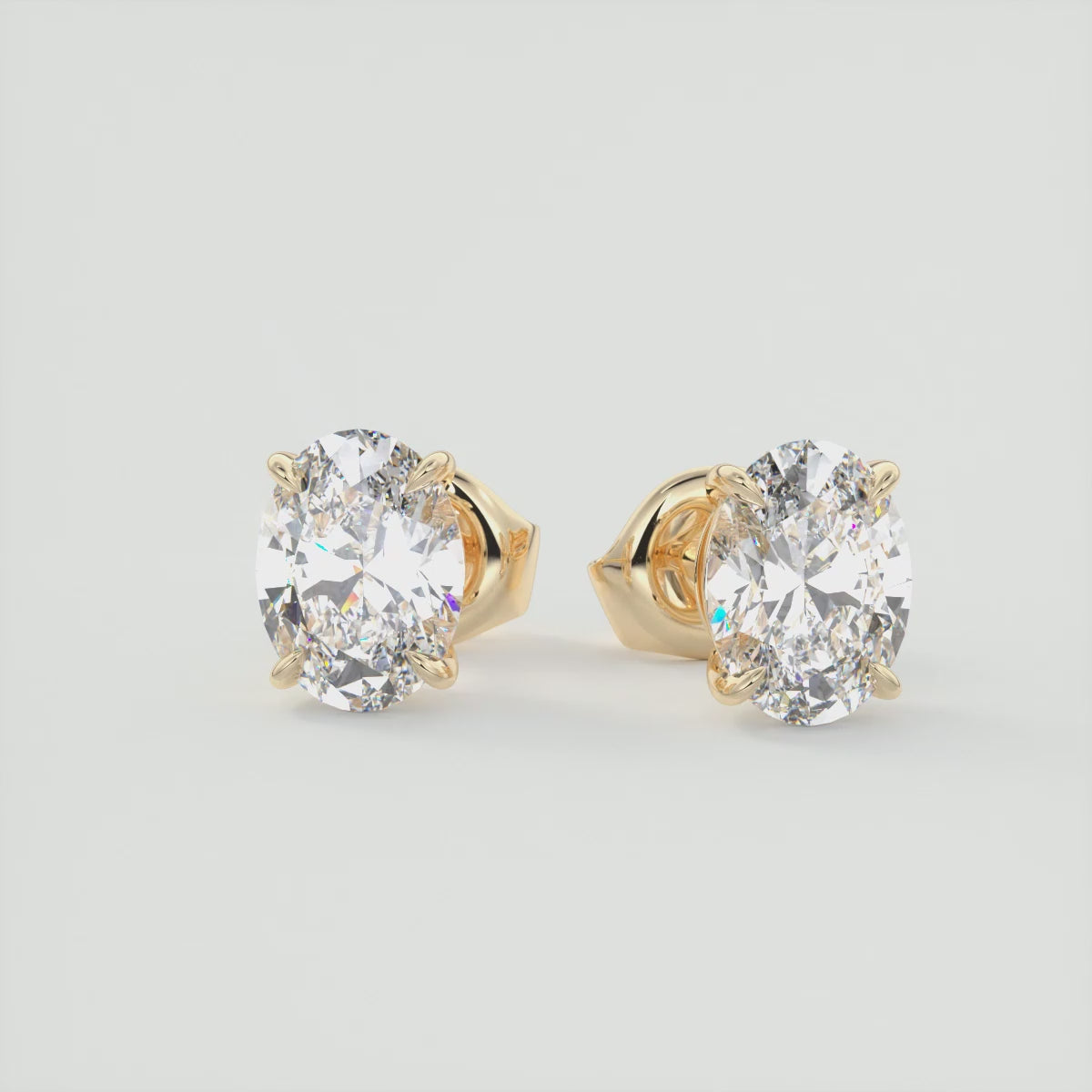 Load video: Radiant Oval Elegance Cathedral Stud Earrings