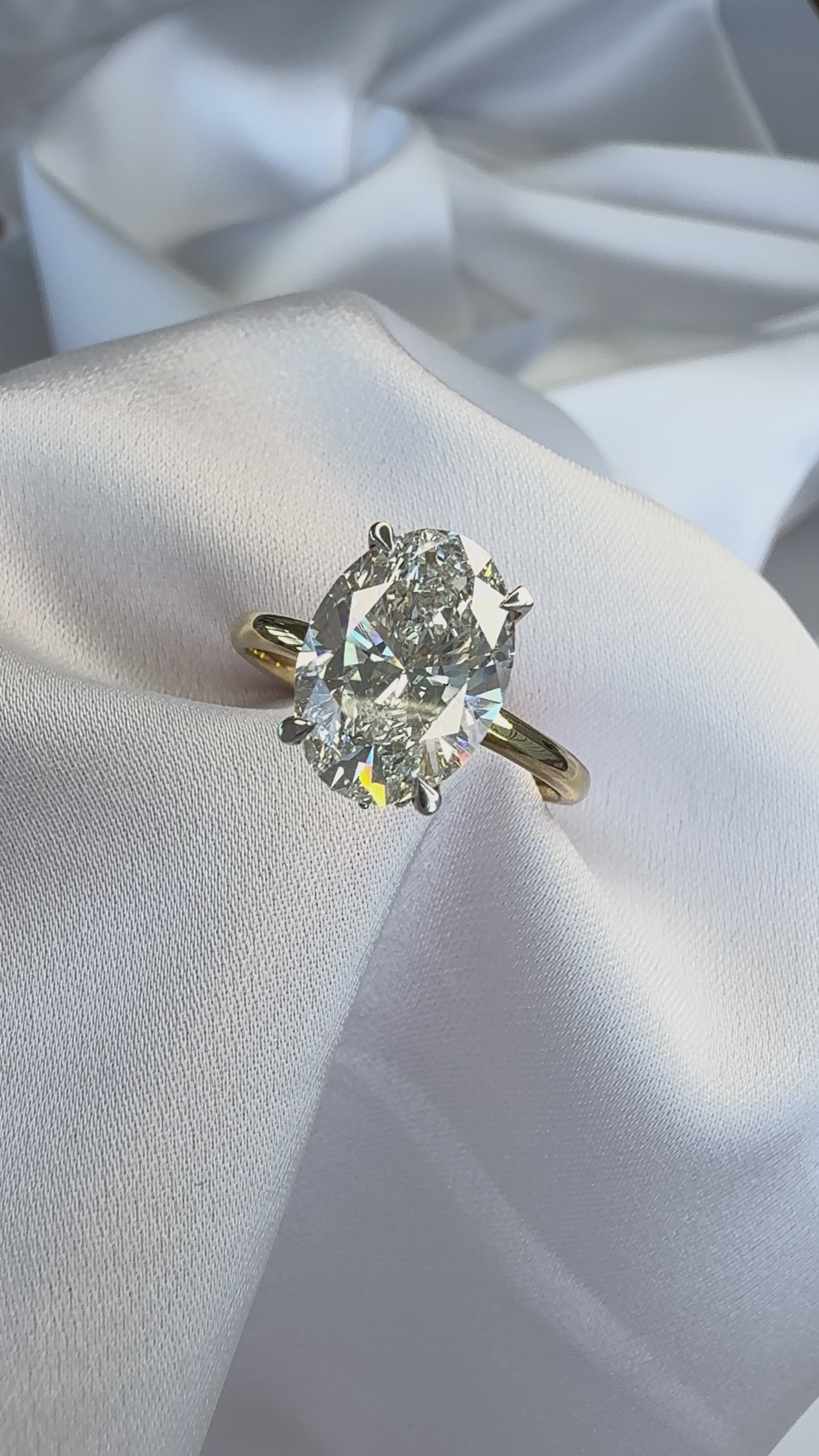 Load video: Aurora Oval Hidden Halo Lab Diamond Engagement Ring – 3.01ct E VVS2 | 18K Yellow Gold with White Gold Prongs