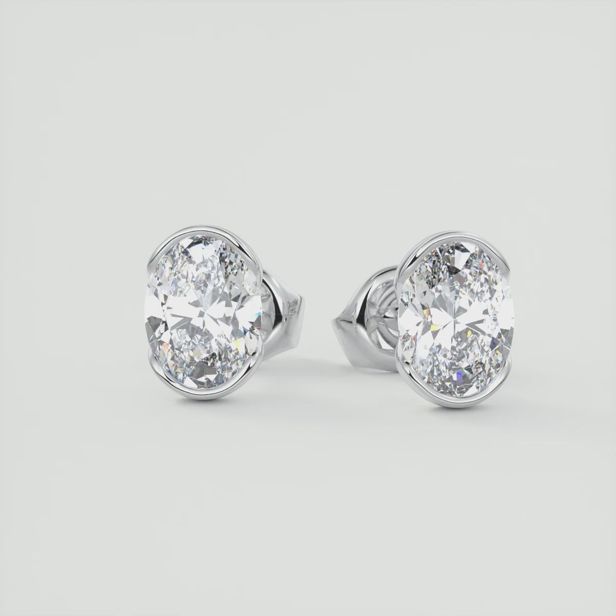 Sleek Oval Half-Bezel Stud Earrings