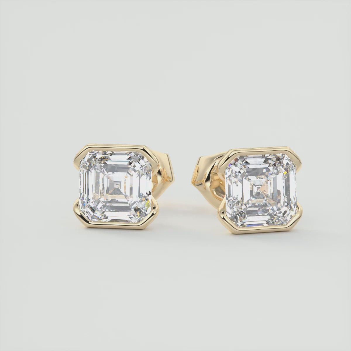 Load video: Sleek Asscher Half-Bezel Stud Earrings