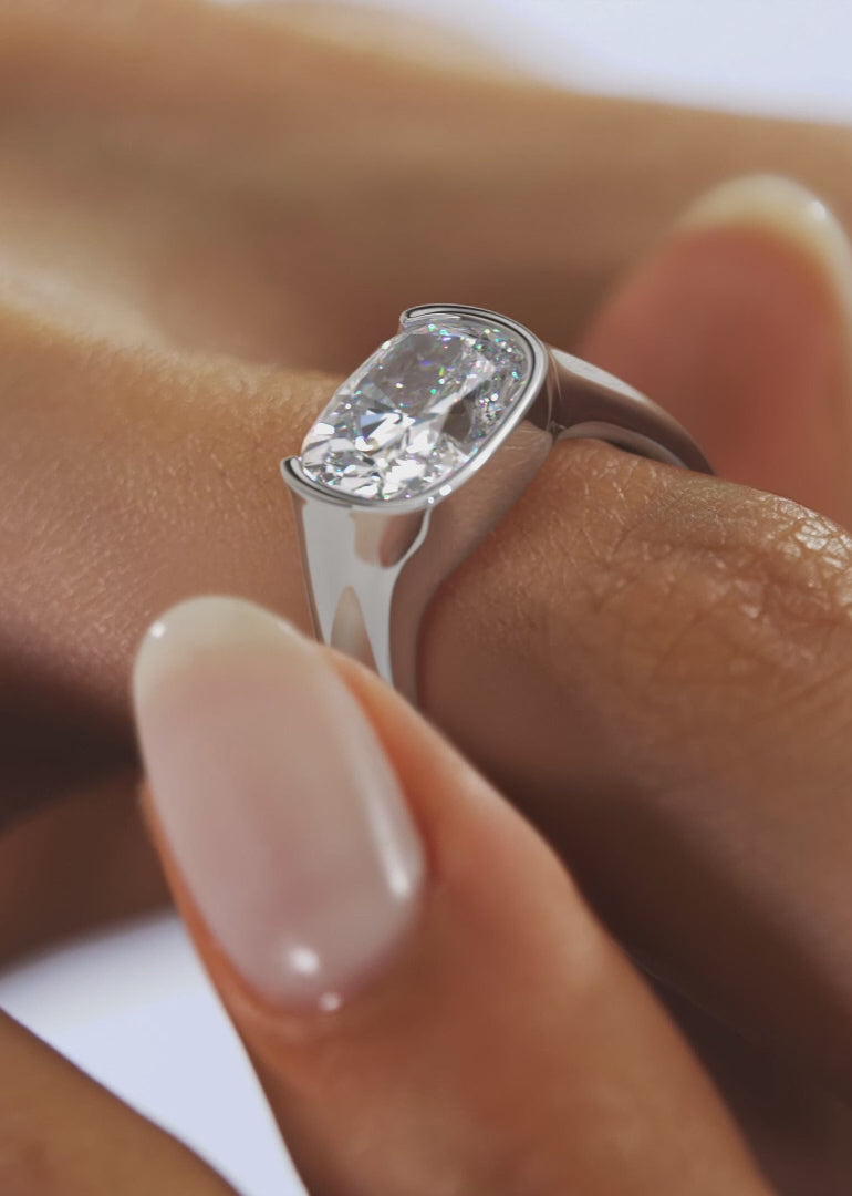 Lyra – East-West Half Bezel Elongated Cushion Engagement Ring