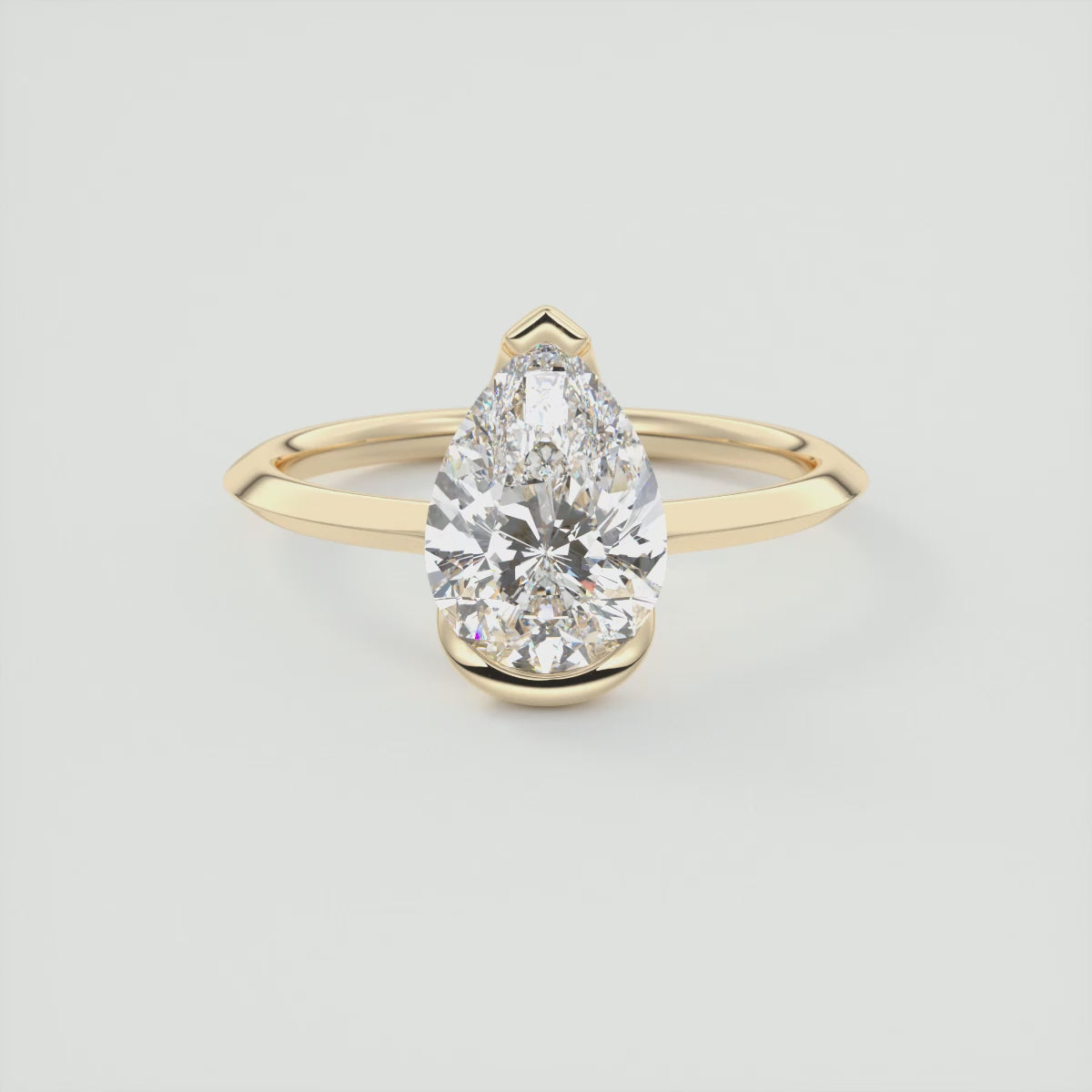 Load video: Solara Pear Half Bezel Ring – Lab Diamond or Moissanite