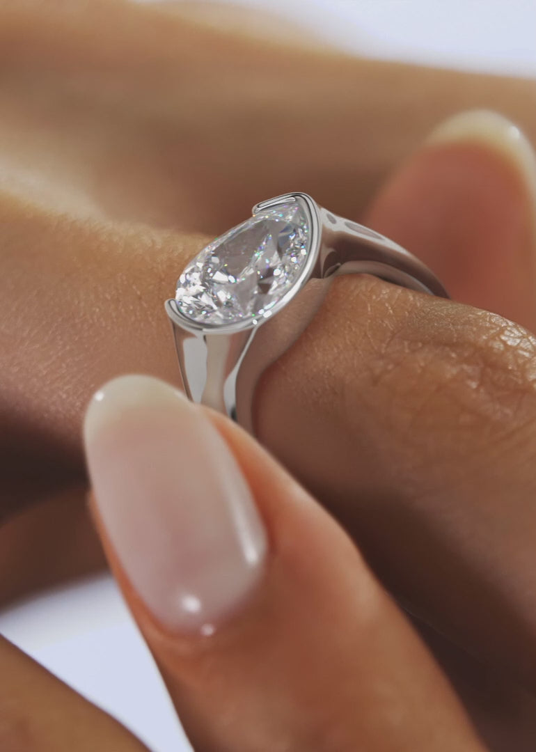 Lyra – East-West Half Bezel Pear Engagement Ring