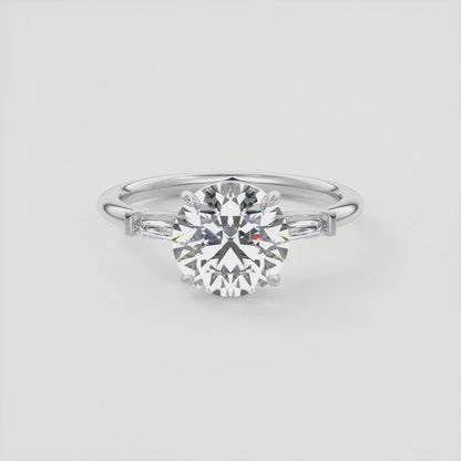 Elysian Round Three-Stone Engagement Ring with Tapered Baguettes
