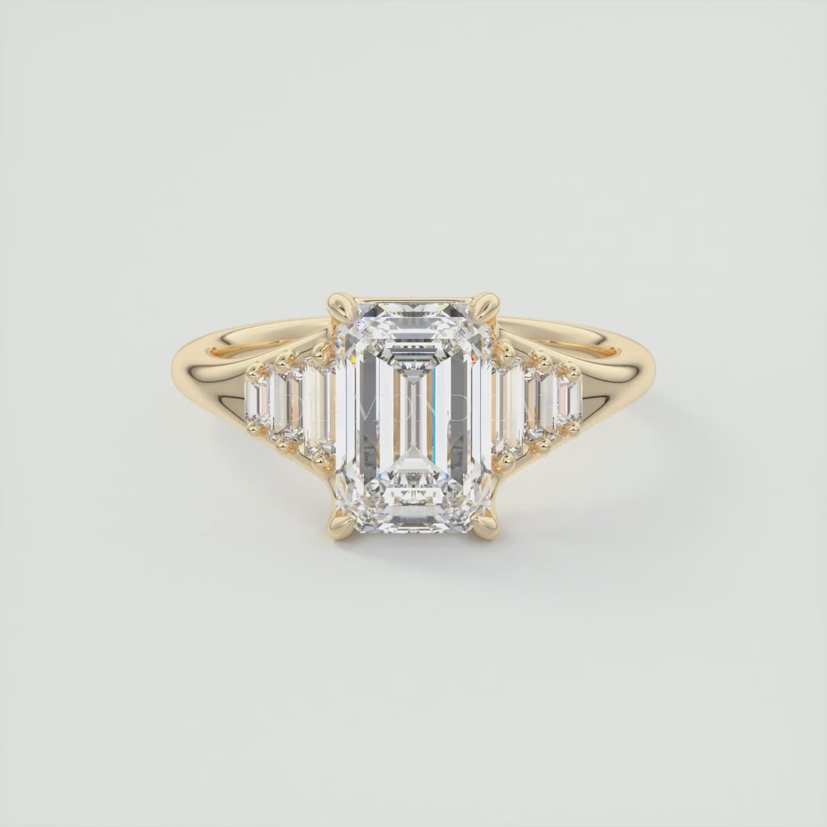 Load video: Solena Emerald Split Shank Engagement Ring with Graduated Baguette Side Stones