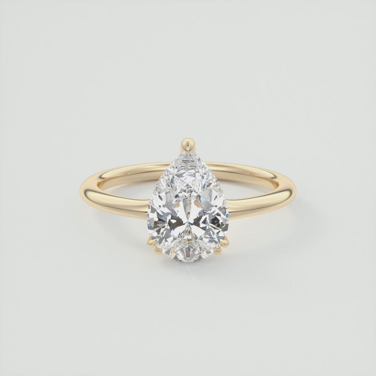 Load video: Aura Glide Pear Solitaire Ring – Lab Diamond or Moissanite, Ultra-Low Profile Design