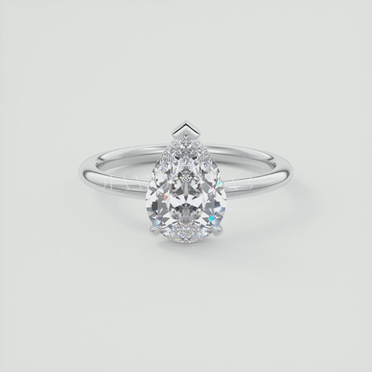 Elysian Pear Solitaire Ring – Timeless Elegance with Lab Diamond or Moissanite
