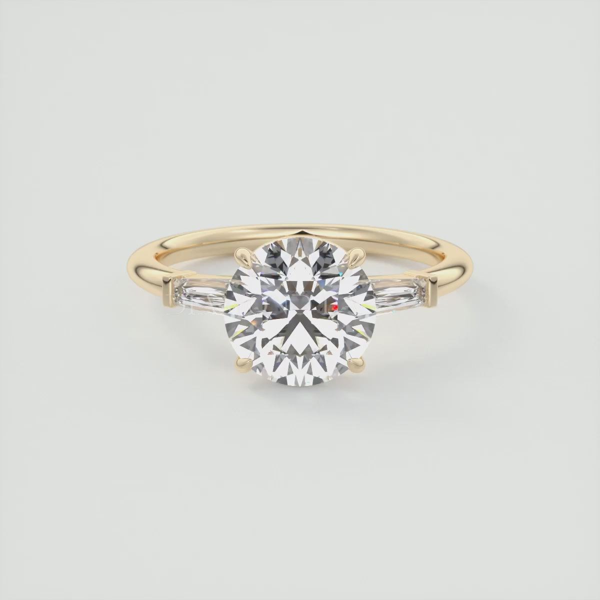 Load video: Elysian Round Three-Stone Engagement Ring with Tapered Baguettes