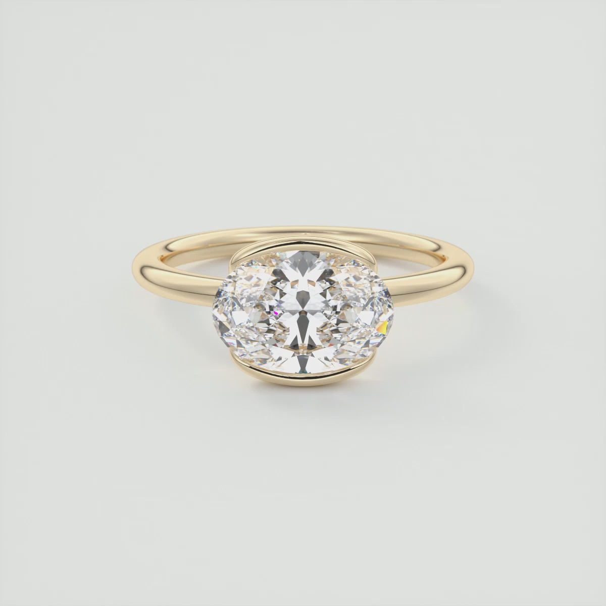 Load video: Solara East-West Oval Half Bezel Ring – Lab Diamond or Moissanite