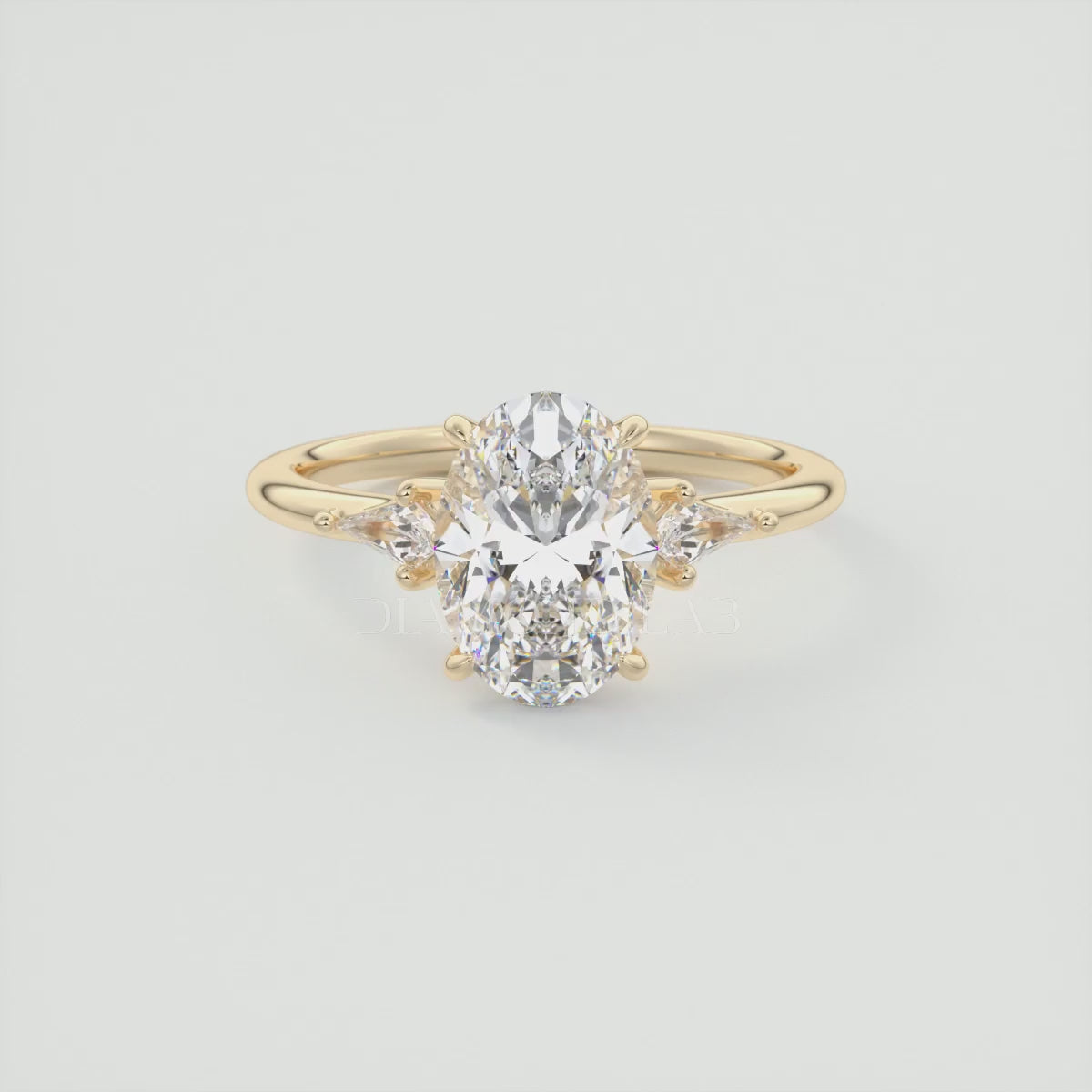 Load video: Elysian Oval Three-Stone Engagement Ring with Kite Side Stones