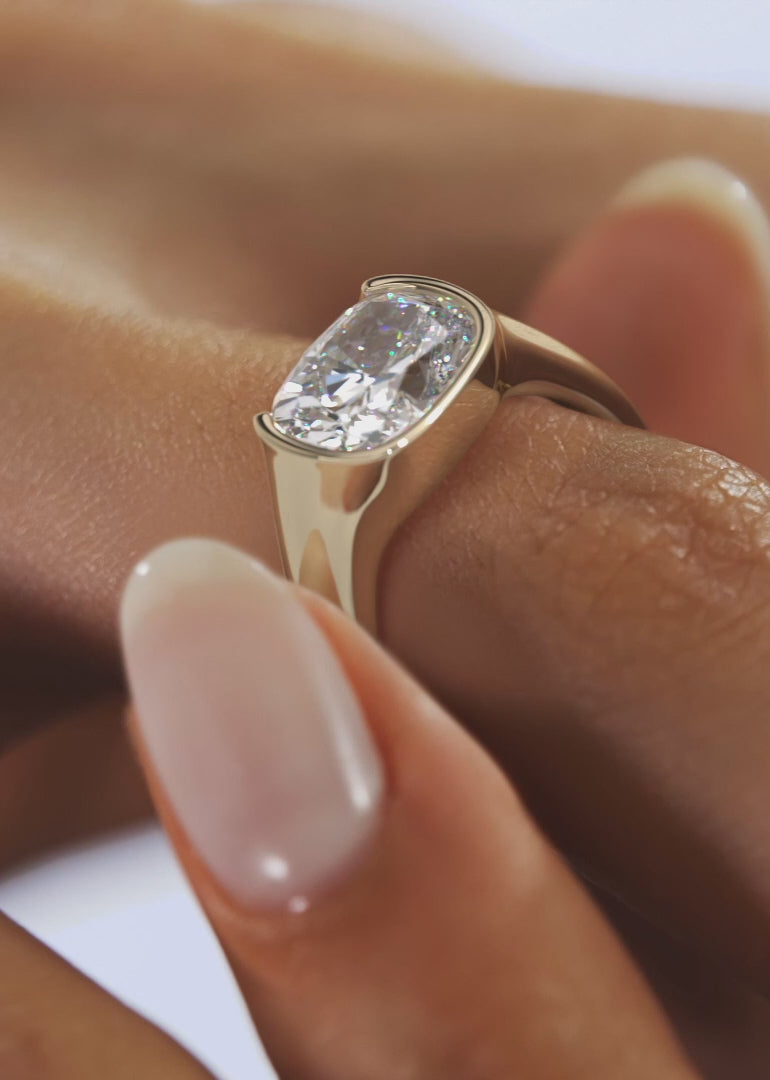 Lyra – East-West Half Bezel Elongated Cushion Engagement Ring