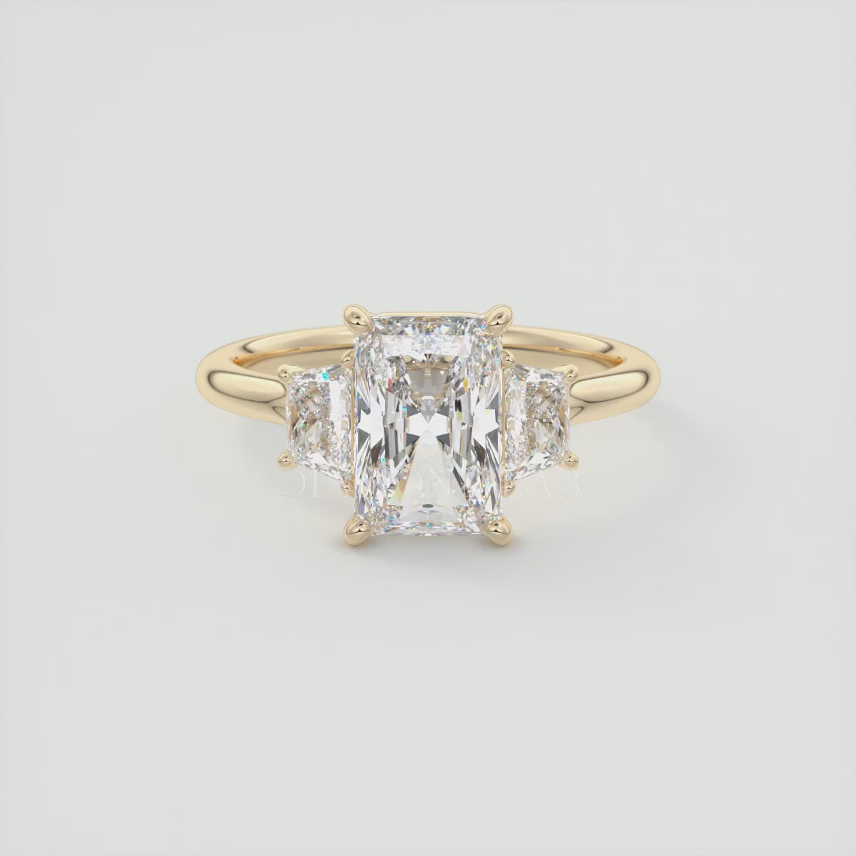 Load video: Elysian Radiant Three-Stone Engagement Ring with Trapezoid Side Stones