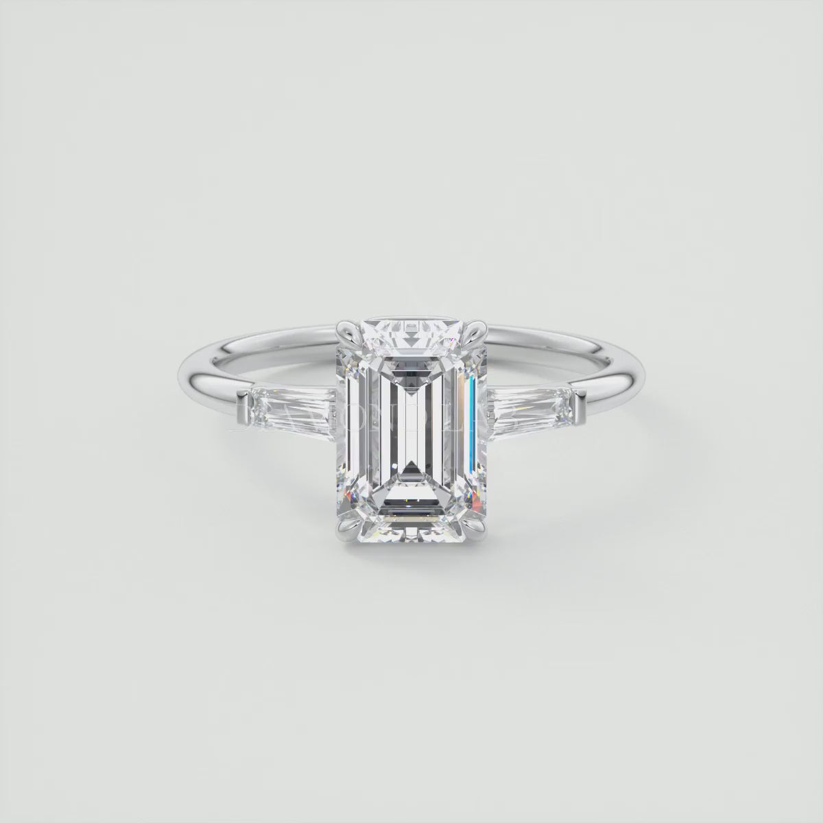 Elysian Emerald Three-Stone Engagement Ring with Tapered Baguettes