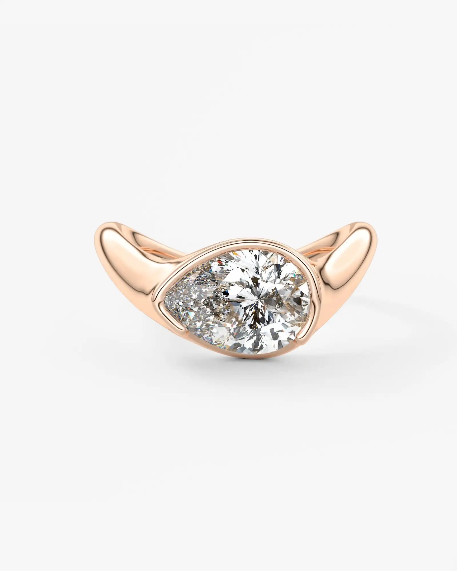 Rose gold ring with a diamond on a white background