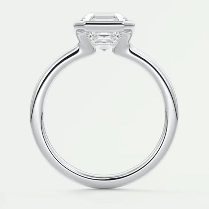 18-karat white gold engagement ring with a princess-cut diamond.