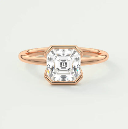 18k rose gold asscher cut diamond engagement ring.