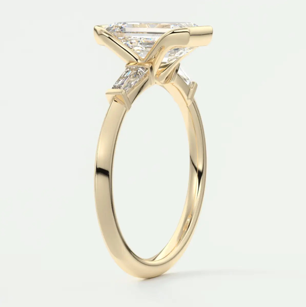 Custom made solara baguette emerald three-stone engagement ring | diamond lab