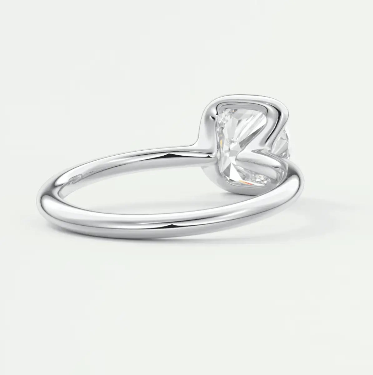 Silver heart-shaped diamond engagement ring with a solitaire setting.