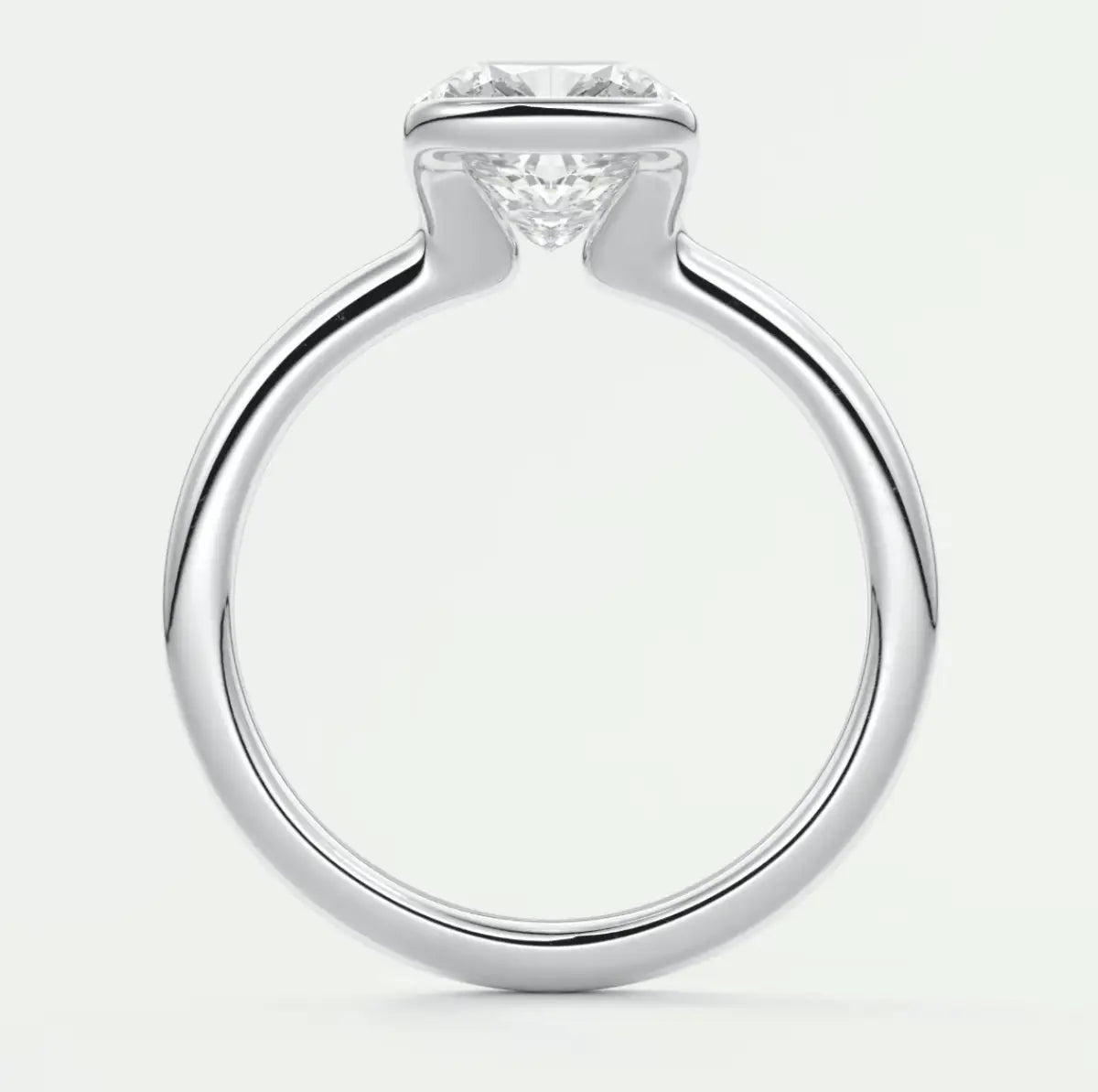 18k white gold engagement ring with a round diamond center stone.