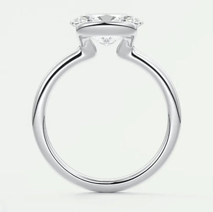 White gold engagement ring with a princess cut diamond.