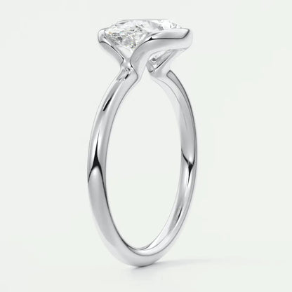 18-karat white gold engagement ring with a princess-cut diamond.